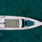 Elegant side view of the Axopar 37 XC Cabin during a premium transfer from Corfu