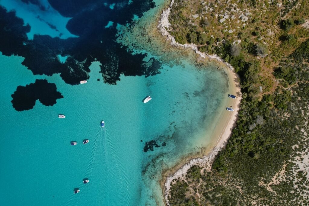 The Blue Lagoon of Diaporos Island, Vourvourou, Sithonia, Halkidiki — crystal-clear turquoise water on a private boat cruise with Explore Boat Trips